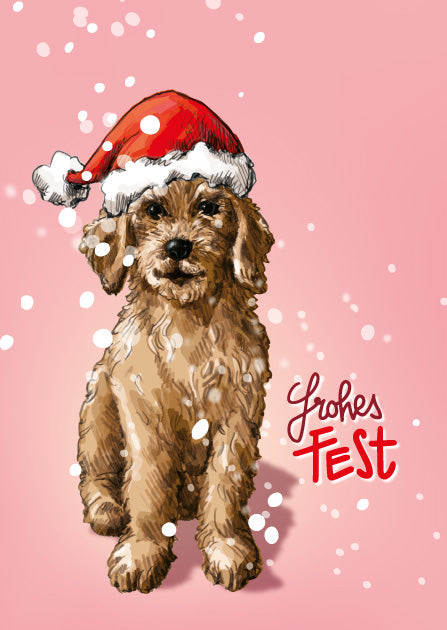 Illi Weihnachtskarte mit einem Hund im Nikolaushut vor rosafarbenem Hintergrund und dem Schriftzug „Frohes Fest“.